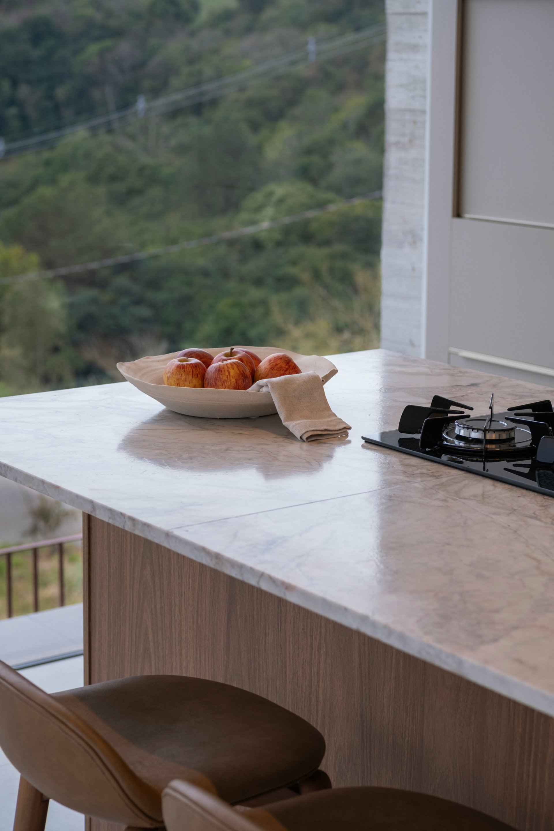 Marble island countertop with cooktop